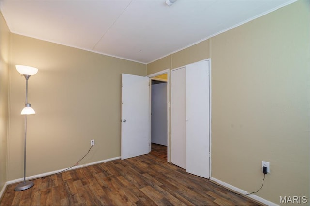 33 Southbrook Dr, Rolla, MO 65401 - unfurnished bedroom with wood finished floors, crown molding, and a closet
