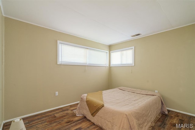 33 Southbrook Dr, Rolla, MO 65401 - bedroom with wood finished floors and crown molding