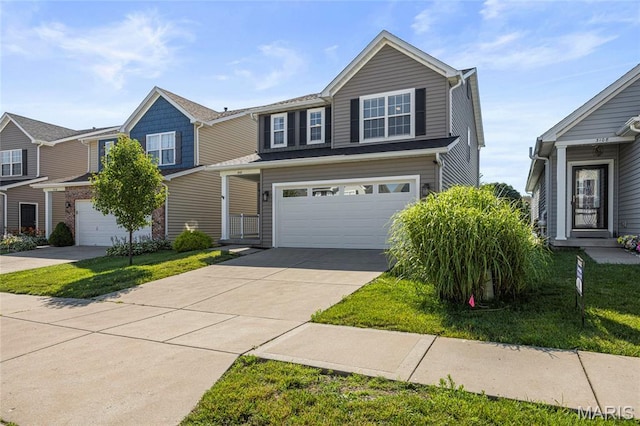 3112 Bentwater Pl, Saint Charles, MO 63301 - traditional-style house with driveway, a garage, and a front lawn