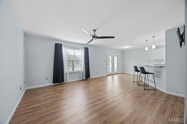 3112 Bentwater Pl, Saint Charles, MO 63301 - unfurnished living room featuring ceiling fan and wood finished floors