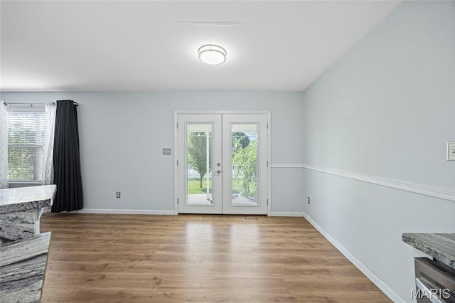 3112 Bentwater Pl, Saint Charles, MO 63301 - empty room with wood finished floors and french doors