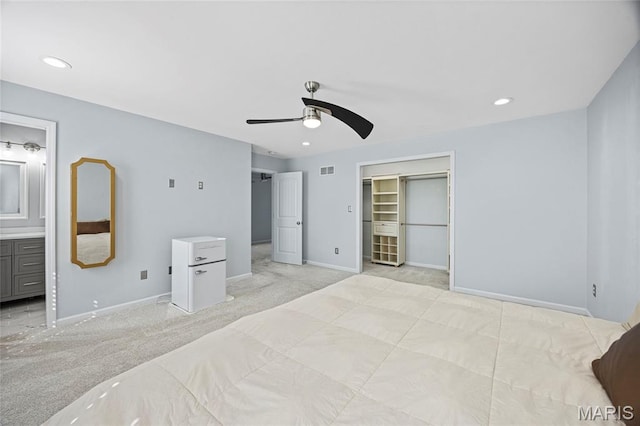 3112 Bentwater Pl, Saint Charles, MO 63301 - unfurnished bedroom with light carpet, recessed lighting, ceiling fan, ensuite bath, and a spacious closet