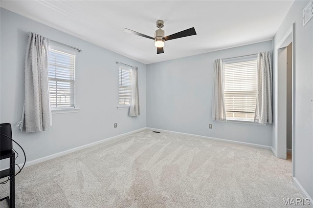 3112 Bentwater Pl, Saint Charles, MO 63301 - carpeted spare room featuring a ceiling fan and baseboards
