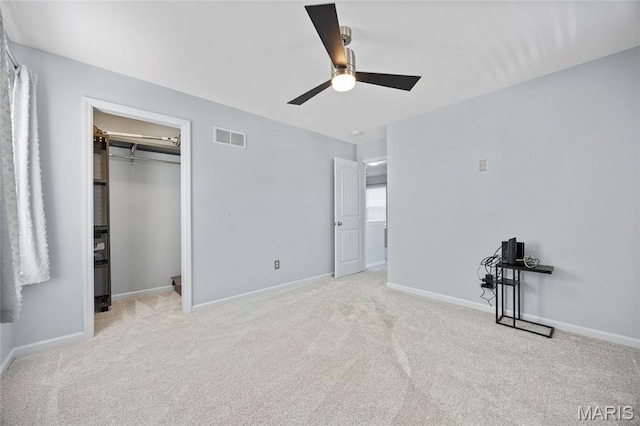 3112 Bentwater Pl, Saint Charles, MO 63301 - unfurnished bedroom featuring carpet floors, a walk in closet, and a ceiling fan