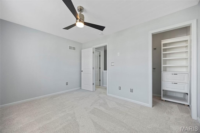 3112 Bentwater Pl, Saint Charles, MO 63301 - unfurnished bedroom with light carpet, a walk in closet, and ceiling fan