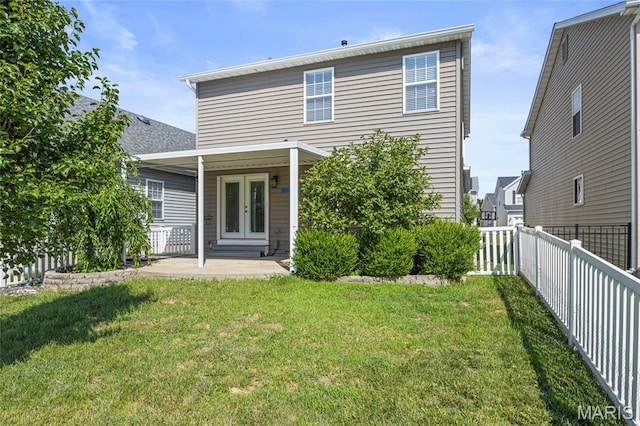 3112 Bentwater Pl, Saint Charles, MO 63301 - rear view of property featuring a fenced backyard and french doors