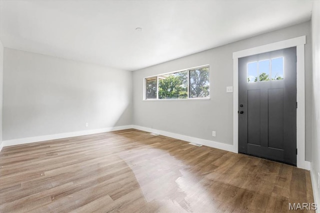 200 Francisca Dr, Florissant, MO 63031 - foyer featuring wood finished floors and baseboards