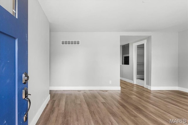 200 Francisca Dr, Florissant, MO 63031 - spare room featuring wood finished floors and baseboards