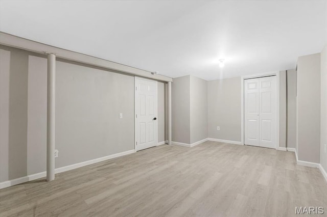 200 Francisca Dr, Florissant, MO 63031 - finished below grade area featuring light wood-style floors and baseboards