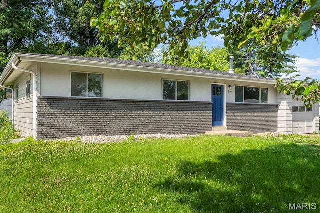 200 Francisca Dr, Florissant, MO 63031 - single story home with brick siding, stucco siding, and a front lawn