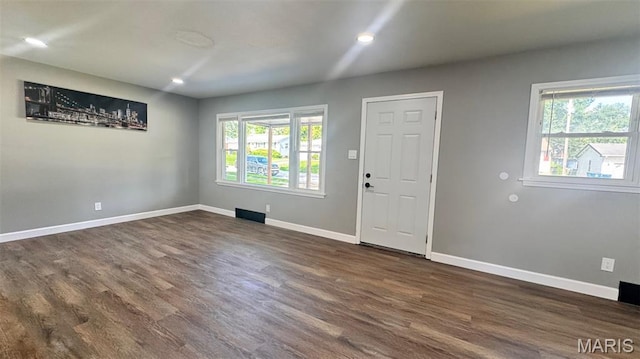 6613 Dunwold Dr, Saint Louis, MO 63134 - foyer featuring dark wood-style flooring and recessed lighting