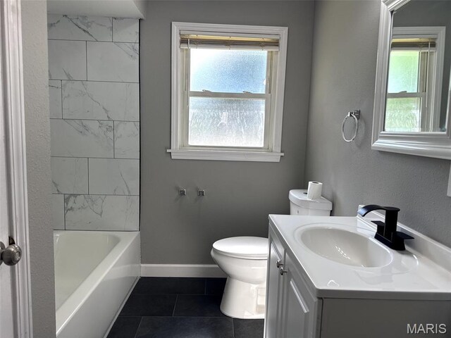 6613 Dunwold Dr, Saint Louis, MO 63134 - full bath featuring tile patterned flooring, vanity, and bathtub / shower combination