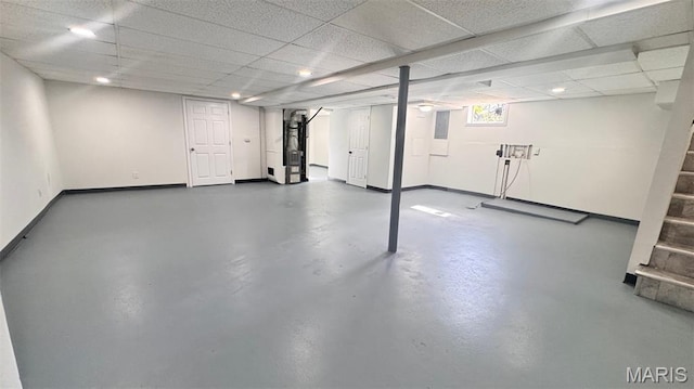6613 Dunwold Dr, Saint Louis, MO 63134 - basement with stairs, recessed lighting, and a drop ceiling
