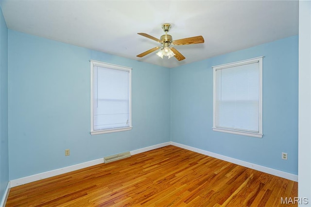 517 E 2nd St, Rolla, MO 65401 - empty room featuring wood finished floors and ceiling fan