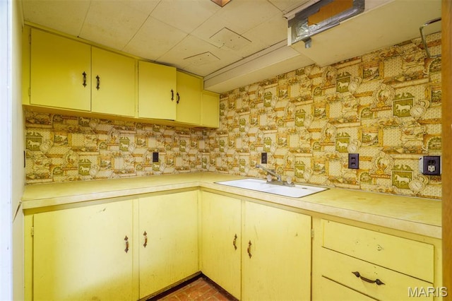517 E 2nd St, Rolla, MO 65401 - kitchen featuring light countertops, yellow cabinetry, and cream cabinetry