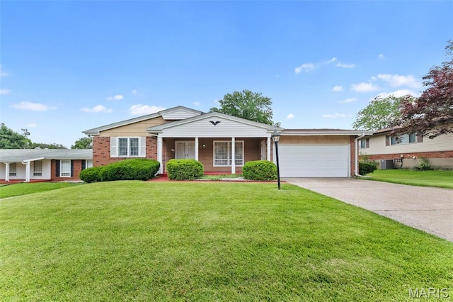 670 Gateswood Dr, Florissant, MO 63033 - single story home featuring brick siding, an attached garage, driveway, and a front lawn