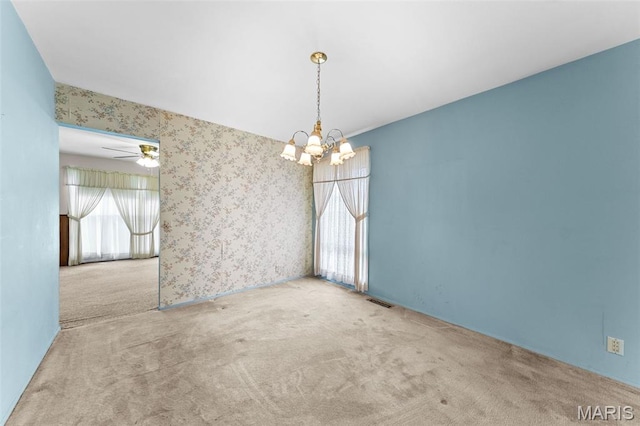 670 Gateswood Dr, Florissant, MO 63033 - carpeted spare room with a chandelier and ceiling fan