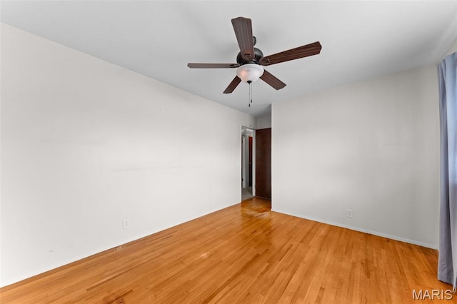 670 Gateswood Dr, Florissant, MO 63033 - empty room with light wood finished floors and ceiling fan