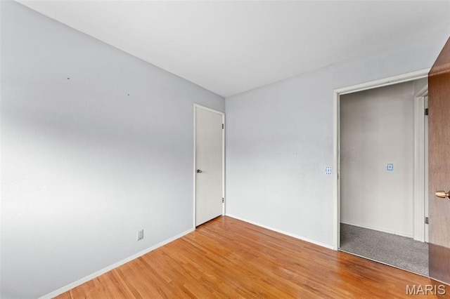 670 Gateswood Dr, Florissant, MO 63033 - unfurnished room featuring light wood finished floors and baseboards