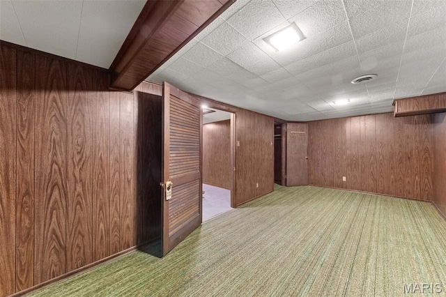 670 Gateswood Dr, Florissant, MO 63033 - finished basement featuring wooden walls and carpet floors