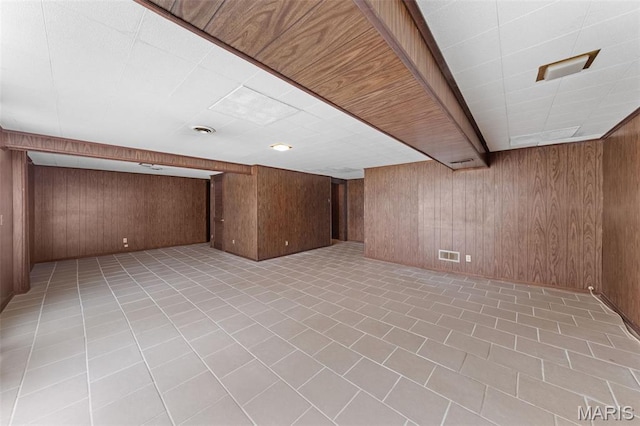 670 Gateswood Dr, Florissant, MO 63033 - finished below grade area with wood walls and light tile patterned floors