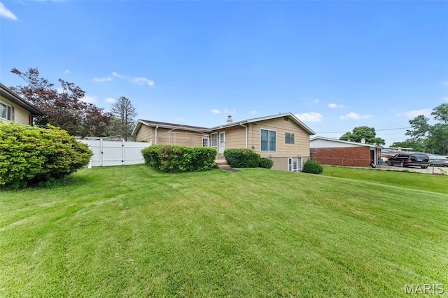 670 Gateswood Dr, Florissant, MO 63033 - view of side of home featuring a gate