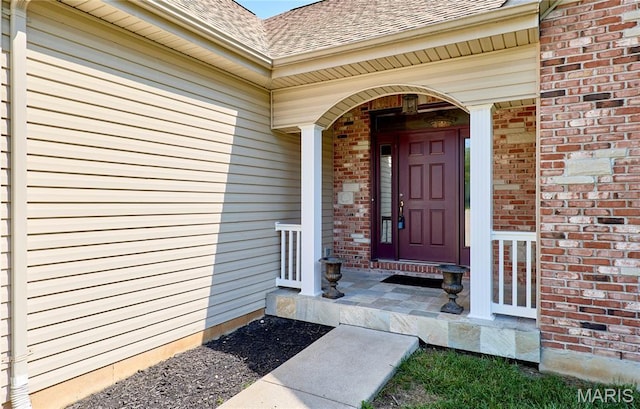5 Tucker Manor Ct, Wentzville, MO 63385 - entrance to property with brick siding and a shingled roof
