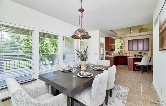 5 Tucker Manor Ct, Wentzville, MO 63385 - dining area with healthy amount of natural light and light tile patterned flooring