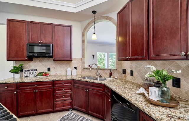 5 Tucker Manor Ct, Wentzville, MO 63385 - kitchen featuring reddish brown cabinets, black appliances, ornamental molding, arched walkways, and light stone countertops