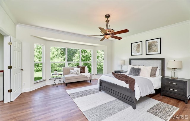 5 Tucker Manor Ct, Wentzville, MO 63385 - bedroom with crown molding, dark wood finished floors, and a ceiling fan