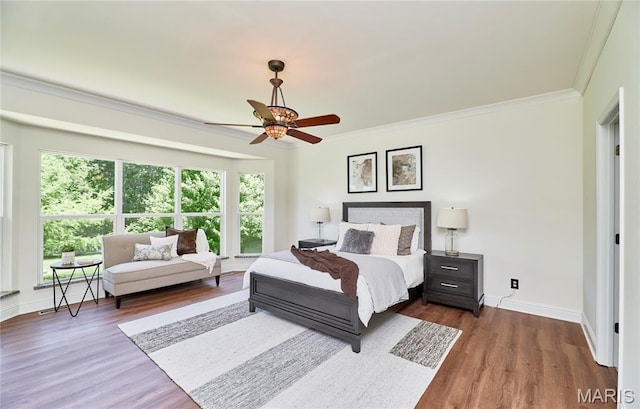 5 Tucker Manor Ct, Wentzville, MO 63385 - bedroom featuring crown molding, dark wood-style flooring, and a ceiling fan