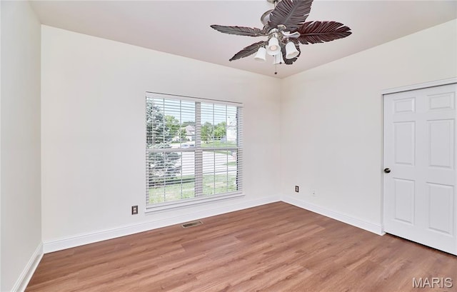 5 Tucker Manor Ct, Wentzville, MO 63385 - spare room featuring wood finished floors and a ceiling fan