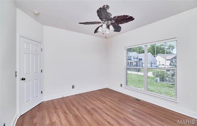 5 Tucker Manor Ct, Wentzville, MO 63385 - spare room with wood finished floors and ceiling fan