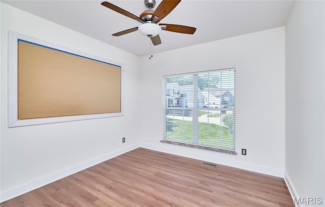 5 Tucker Manor Ct, Wentzville, MO 63385 - empty room featuring wood finished floors and ceiling fan