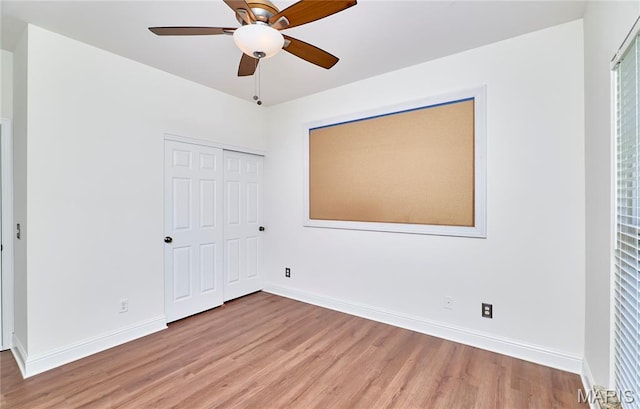 5 Tucker Manor Ct, Wentzville, MO 63385 - unfurnished bedroom with light wood-style flooring, a closet, and ceiling fan
