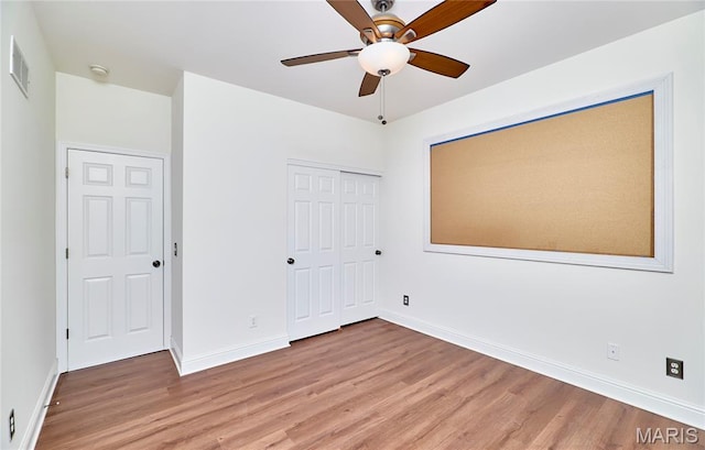 5 Tucker Manor Ct, Wentzville, MO 63385 - unfurnished bedroom with light wood finished floors, a closet, and a ceiling fan