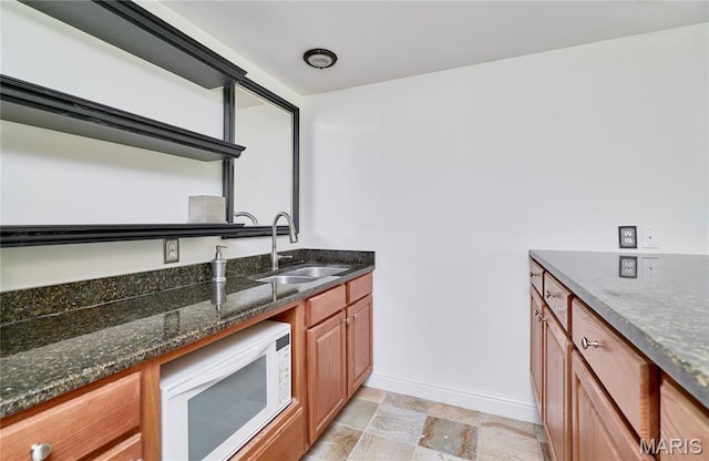 5 Tucker Manor Ct, Wentzville, MO 63385 - bar featuring white microwave and light stone finish floors