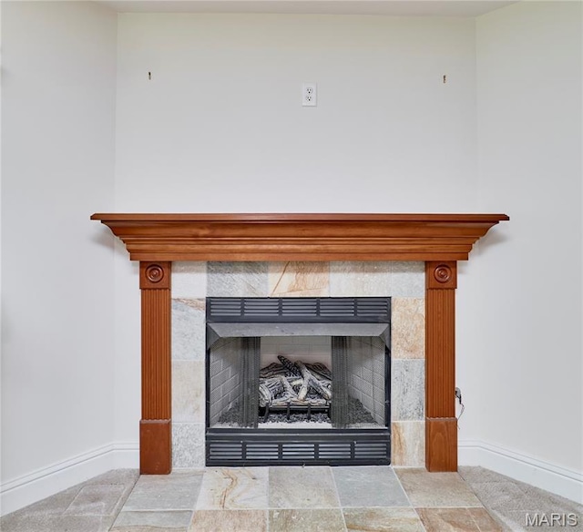 5 Tucker Manor Ct, Wentzville, MO 63385 - detailed view of a fireplace and baseboards