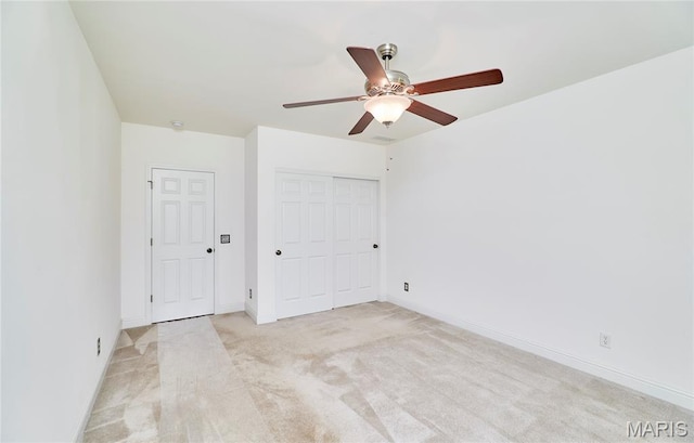 5 Tucker Manor Ct, Wentzville, MO 63385 - unfurnished bedroom featuring light colored carpet, a closet, and ceiling fan