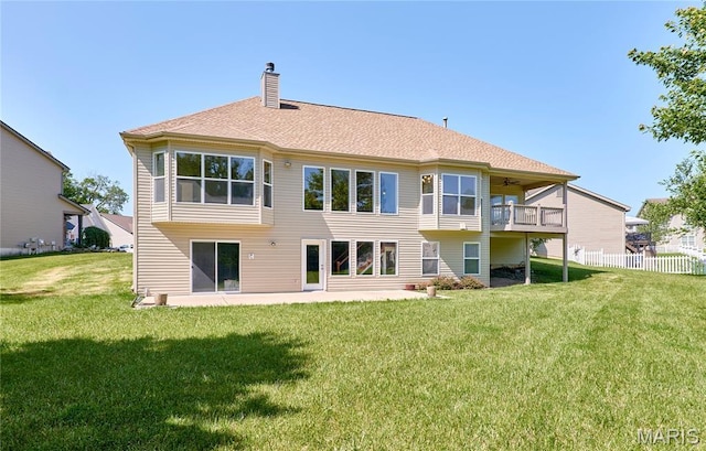 5 Tucker Manor Ct, Wentzville, MO 63385 - back of property featuring a chimney, a balcony, a ceiling fan, and a patio