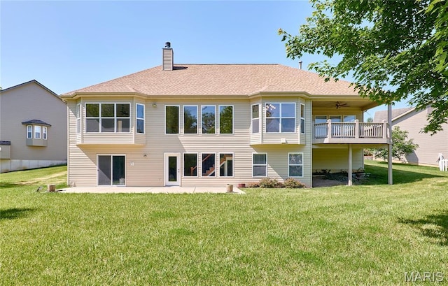 5 Tucker Manor Ct, Wentzville, MO 63385 - rear view of property with a chimney, a yard, and a balcony