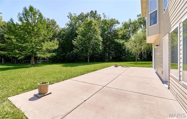5 Tucker Manor Ct, Wentzville, MO 63385 - view of patio / terrace featuring view of wooded area