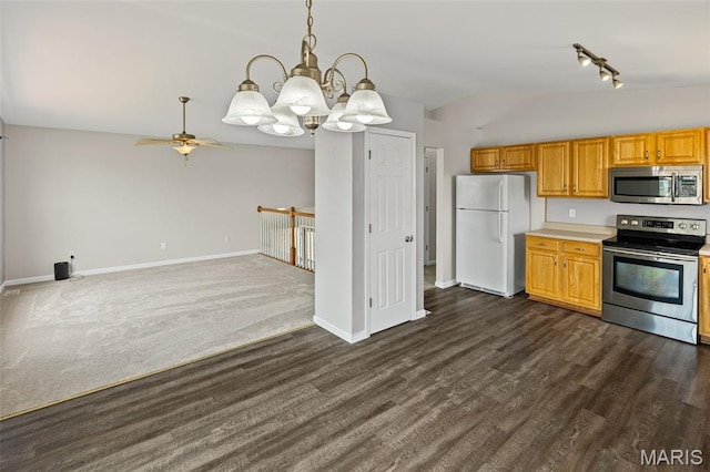 412 Audry Dr, Dupo, IL 62239 - kitchen with appliances with stainless steel finishes, vaulted ceiling, a chandelier, light countertops, and rail lighting