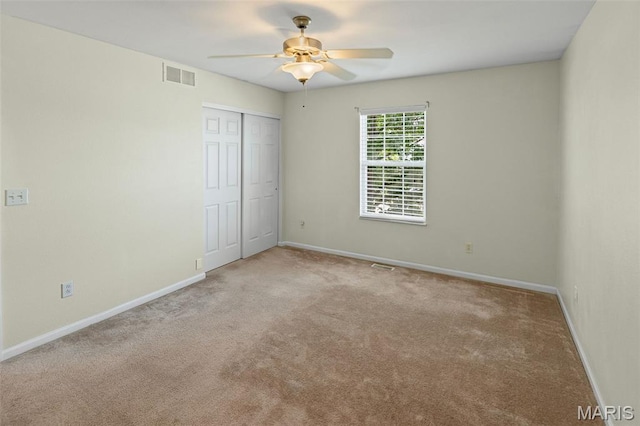 412 Audry Dr, Dupo, IL 62239 - unfurnished bedroom with carpet floors, a closet, and ceiling fan