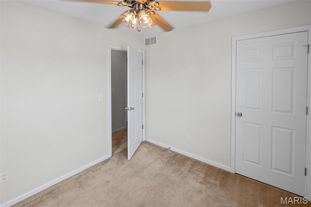412 Audry Dr, Dupo, IL 62239 - unfurnished bedroom featuring light colored carpet and ceiling fan