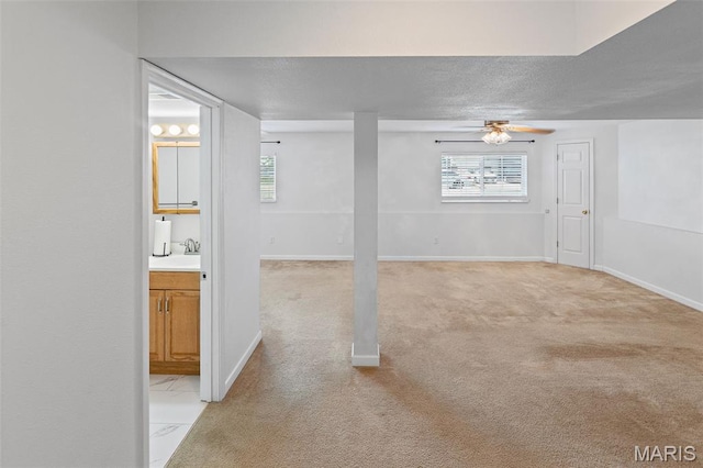 412 Audry Dr, Dupo, IL 62239 - basement with light carpet, healthy amount of natural light, ceiling fan, and a textured ceiling