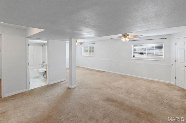 412 Audry Dr, Dupo, IL 62239 - basement with carpet floors, a textured ceiling, and ceiling fan