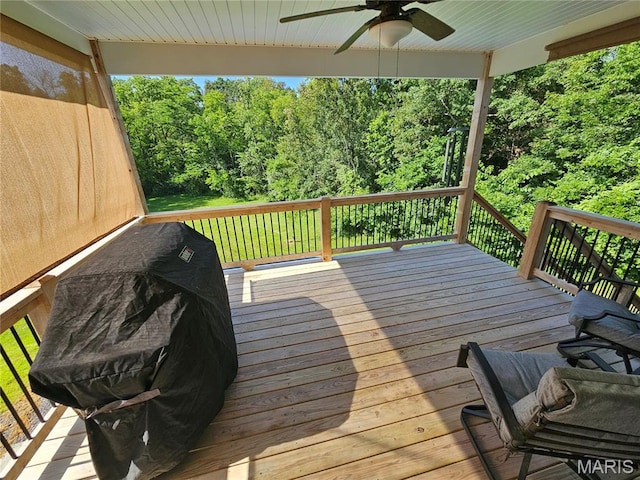 9339 Prairie Ridge Rd, Walsh, IL 62297 - wooden deck featuring ceiling fan and a wooded view