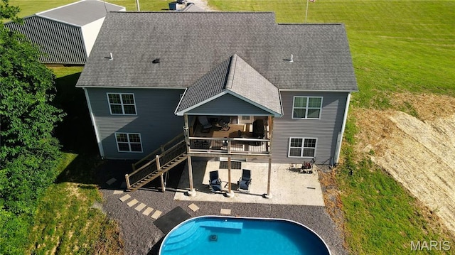 9339 Prairie Ridge Rd, Walsh, IL 62297 - rear view of house featuring a patio, a lawn, stairway, and a wooden deck