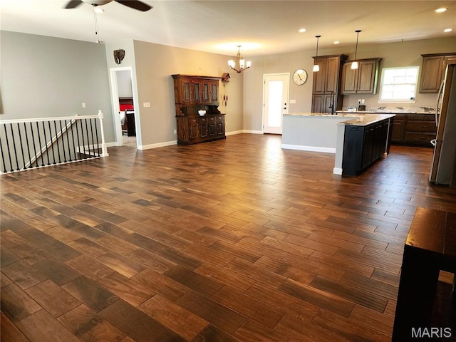 9339 Prairie Ridge Rd, Walsh, IL 62297 - kitchen featuring open floor plan, ceiling fan, dark wood-style flooring, recessed lighting, and a center island